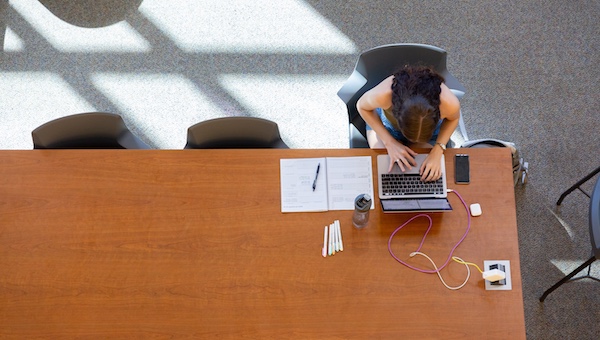 student working on a laptop