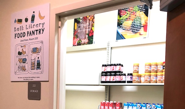 Belk Library food pantry sign and stocked shelves