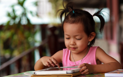 preschooler with tablet