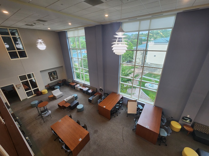 Aerial view of the Borkowski Reading Lounge showing large and small tables and soft seating