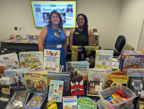 Jenny Coffey and Jewel Davis at Beginner Teacher Summit with books