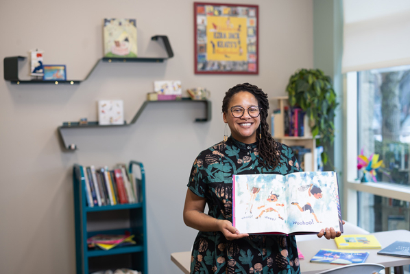 Jewel Davis holding a book 