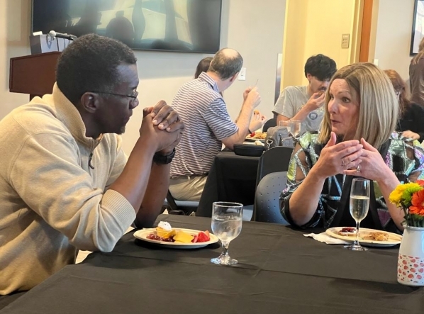 Jason Mott discussing books with Dean Sue Polanka