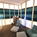 The first floor Sensory Room features floor rockers, alternative lighting, and tools for sensory regulation like fidgets and weighted lap pads.