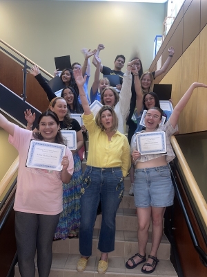 Scholarship recipients on the grand staircase in Belk Library with Dean Polanka