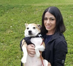 Angela Howell and white and tan dog