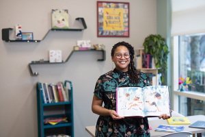 Jewel Davis holding a book 