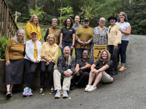 Photograph of Library Advisory Council Members seated in the driveway of Dean Sue Polanka