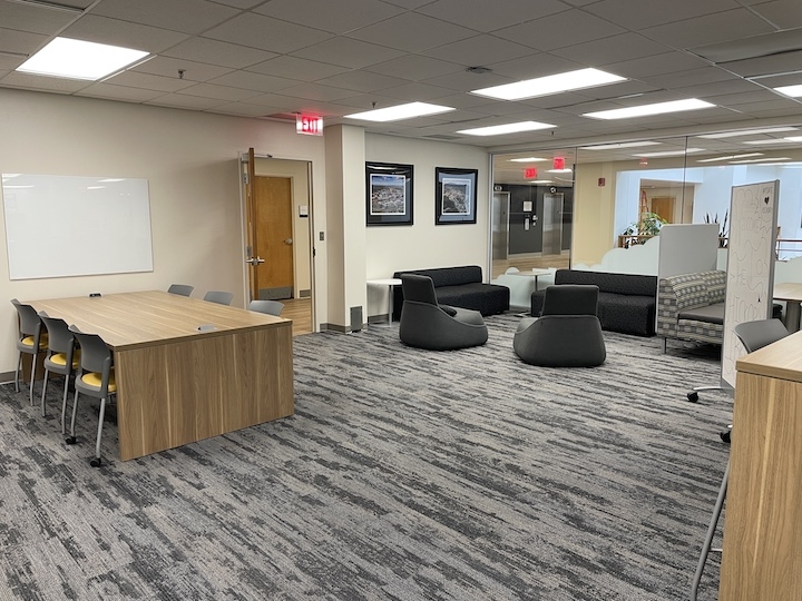 Open six-seat tables and low lounge chairs