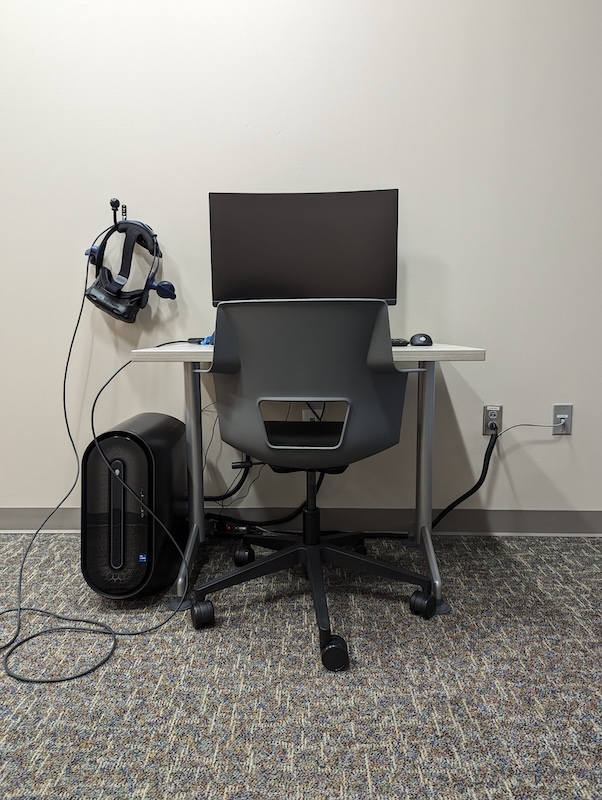 Virtual Reality Studio workstation with desktop computer and VR headset