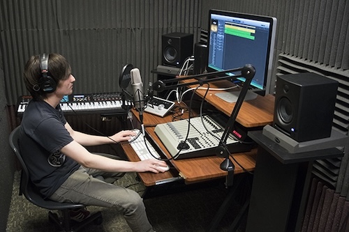 Student working in audio recording room