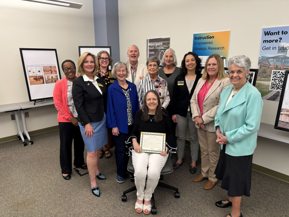 Tracey Ford with Library Advisory Council members and library leadership